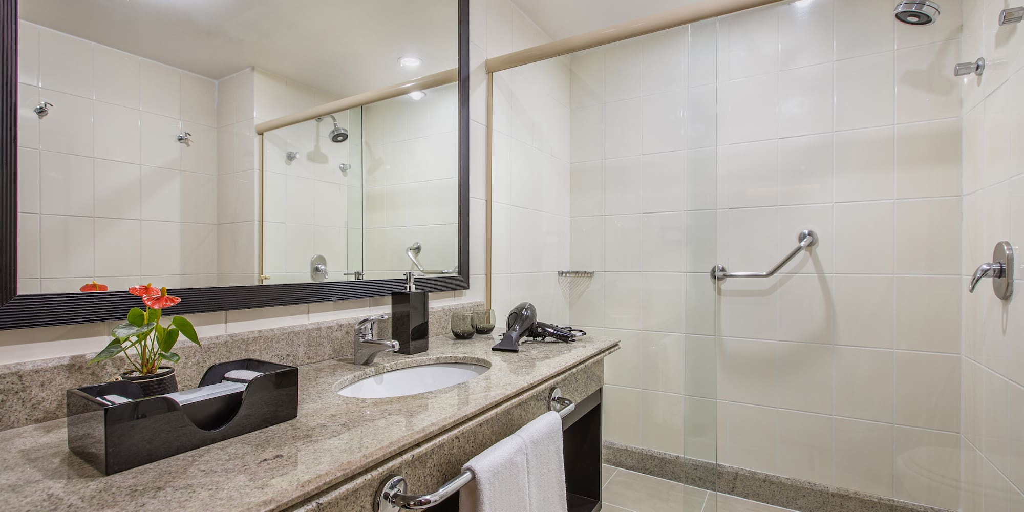 a bathroom with a mirror and sink