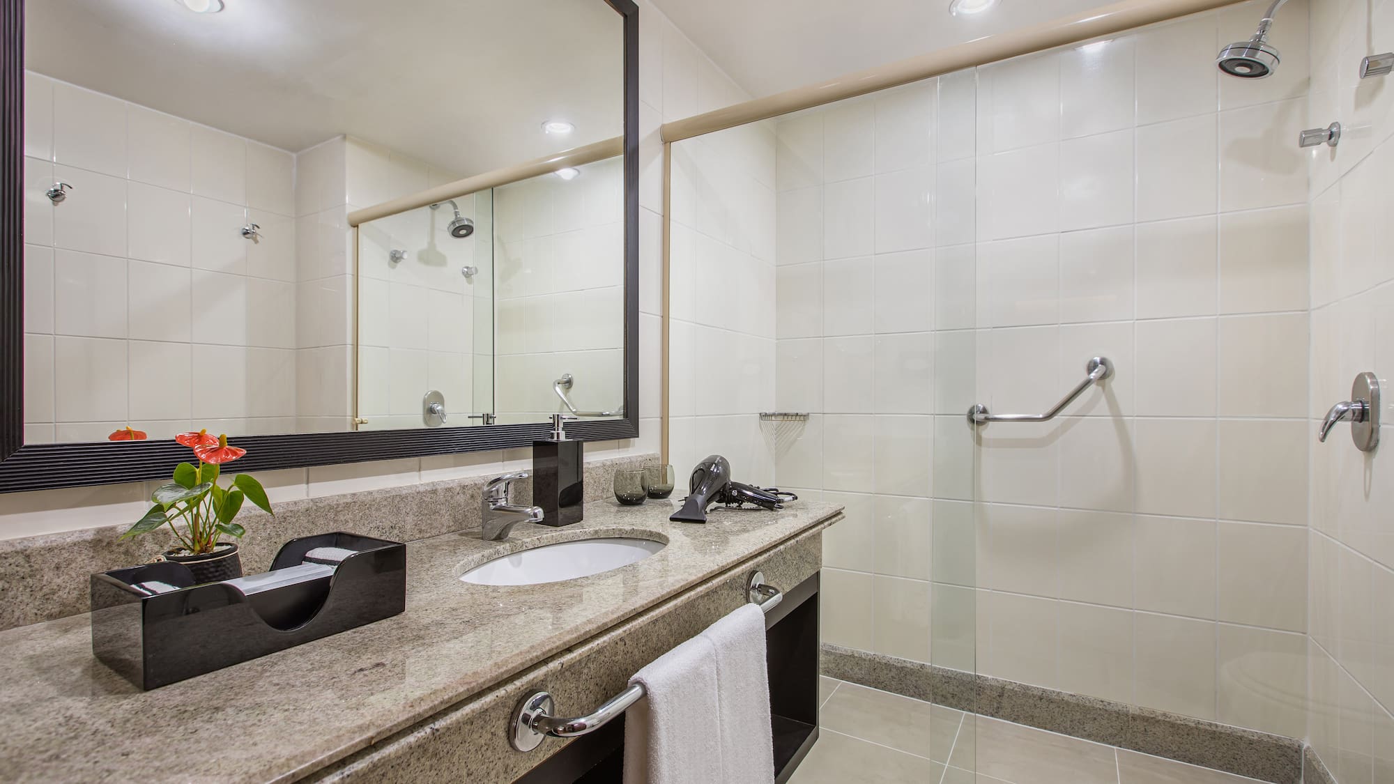 a bathroom with a mirror and sink