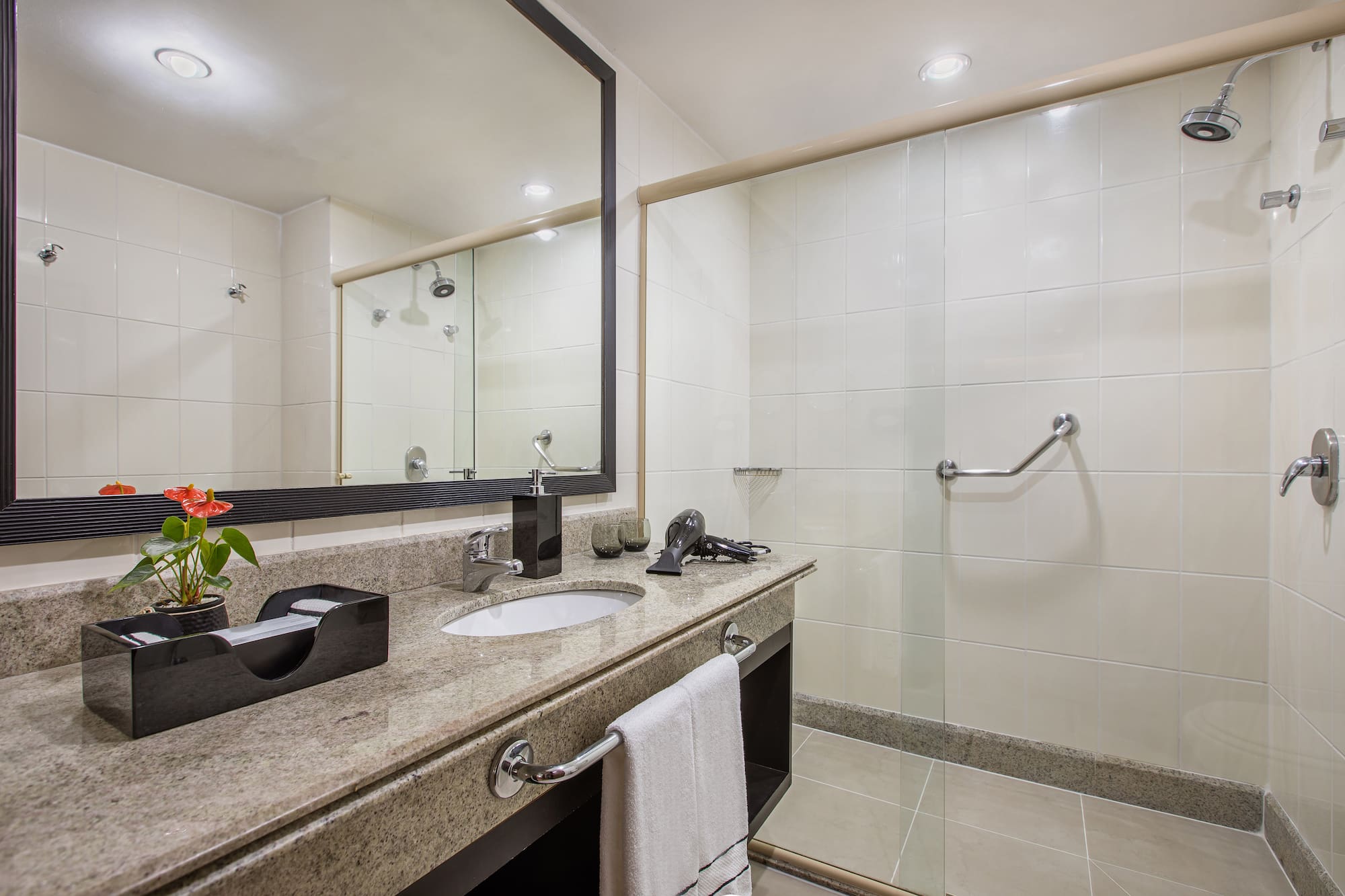 a bathroom with a mirror and sink