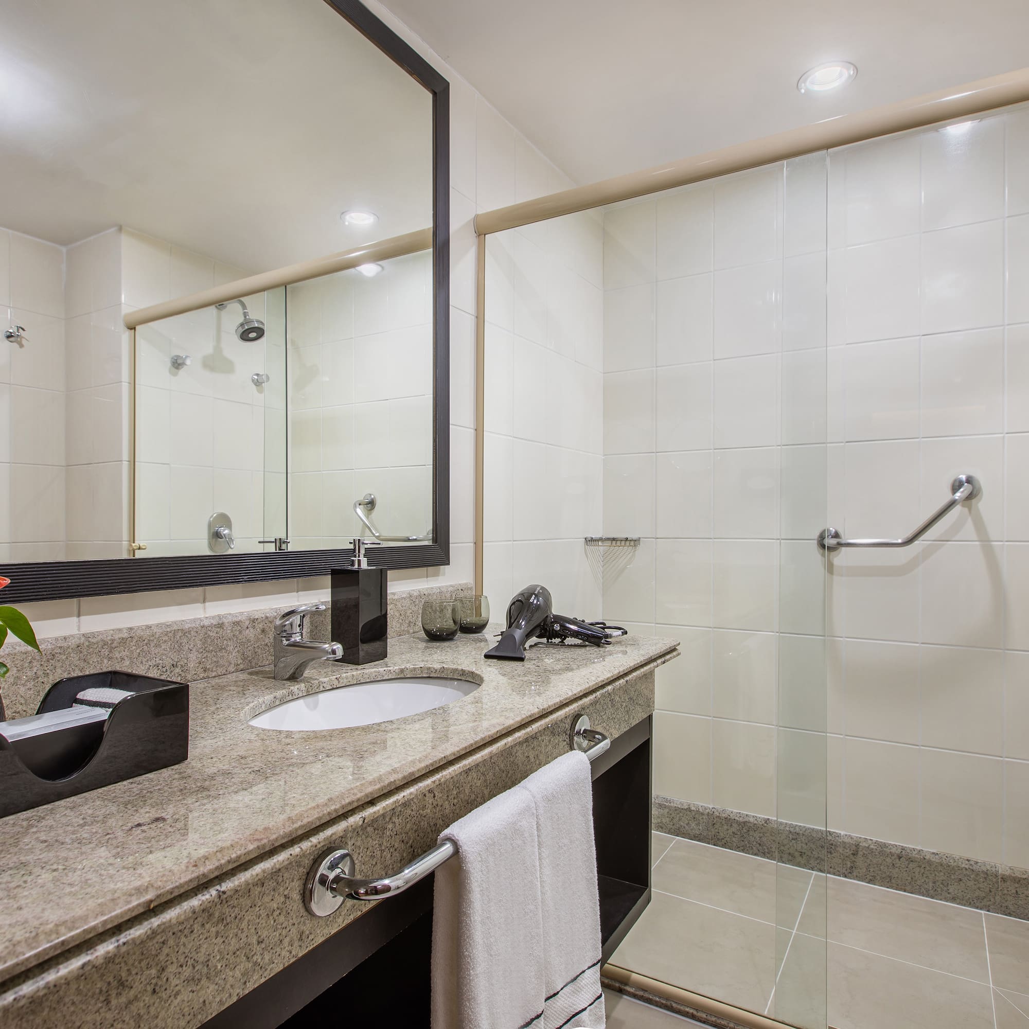 a bathroom with a mirror and sink