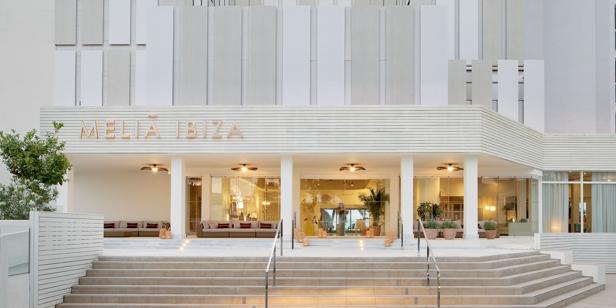 a building with stairs leading to the front