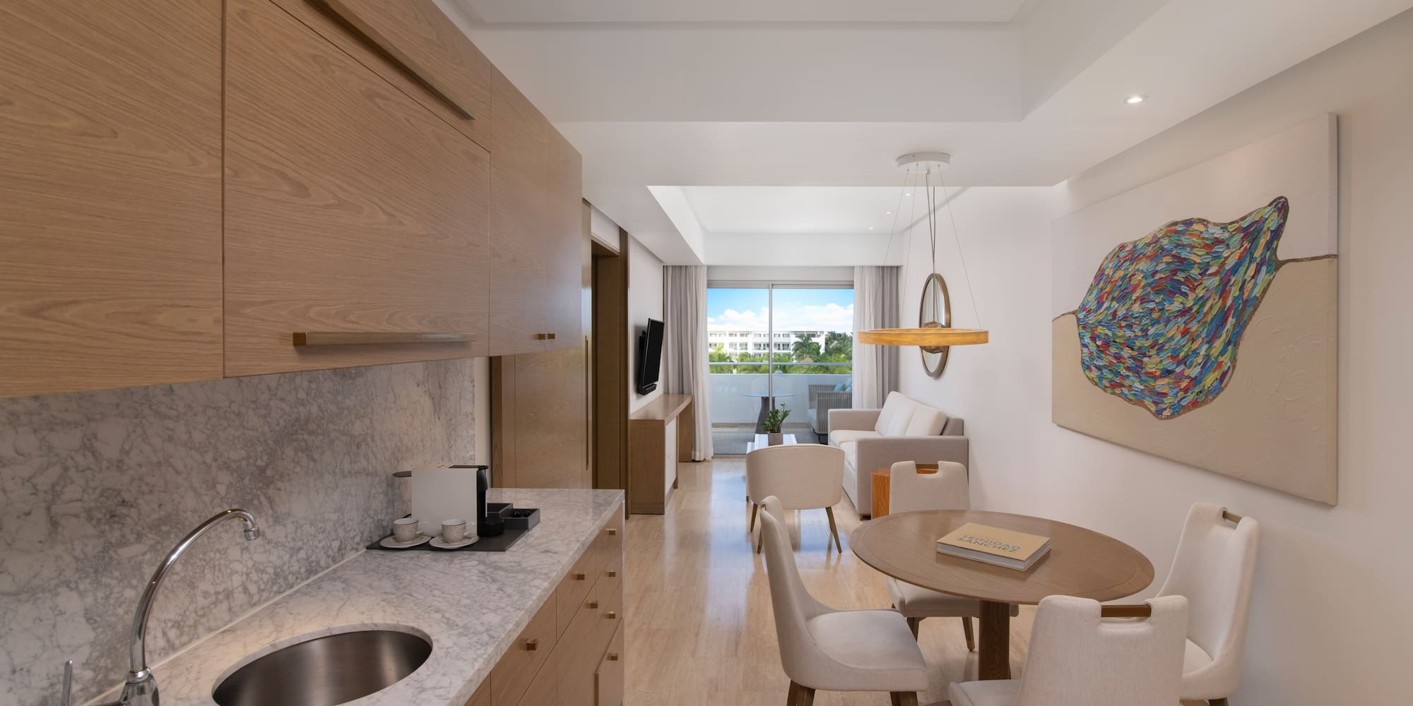 a room with a table and chairs