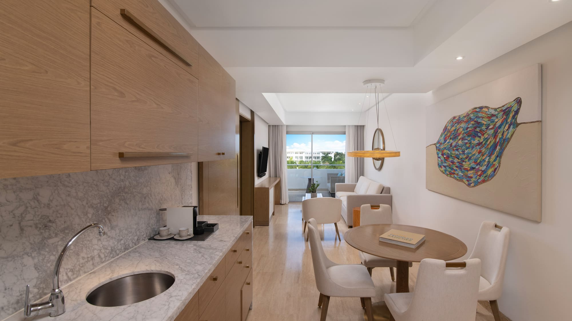 a room with a table and chairs