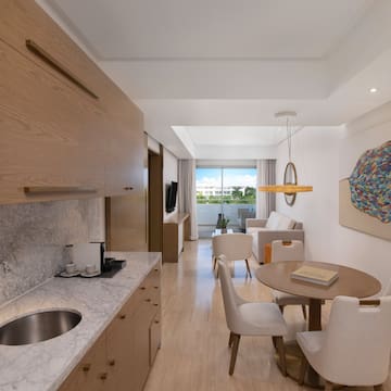 a room with a table and chairs