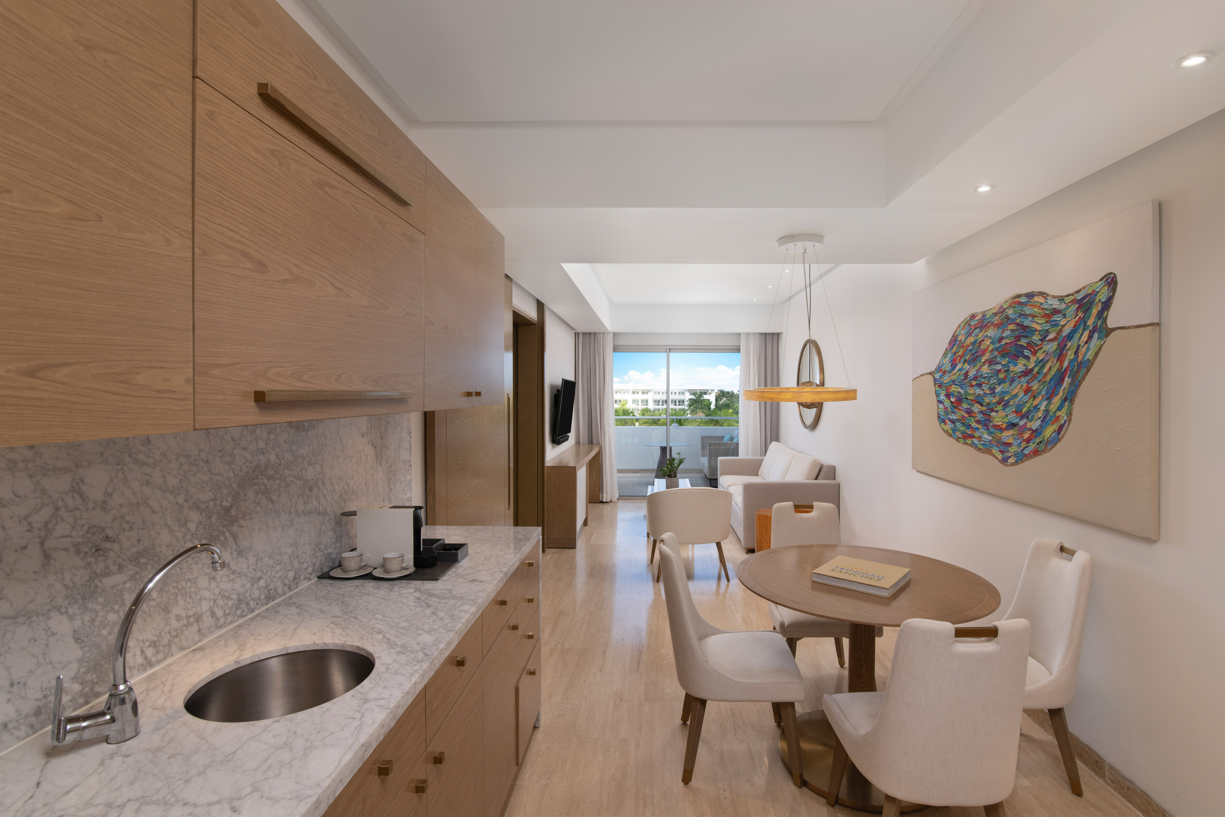 a room with a table and chairs