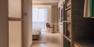 a room with a bed and a table