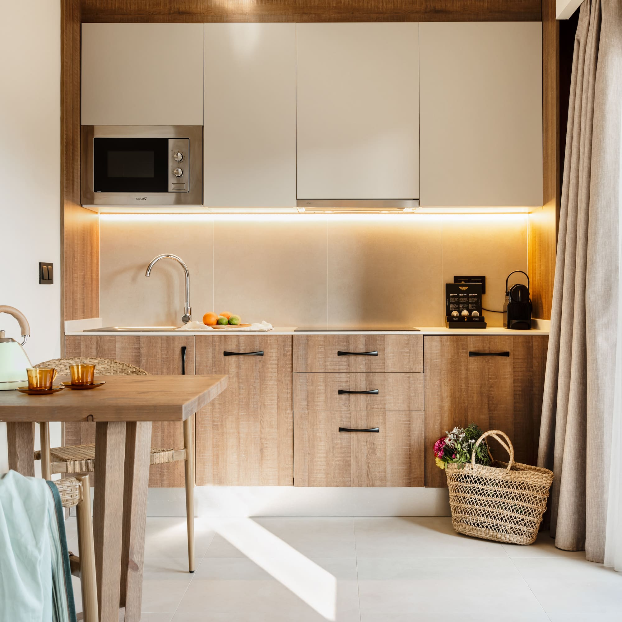 a kitchen with a table and a basket.