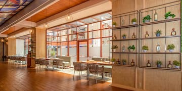 a room with tables and chairs