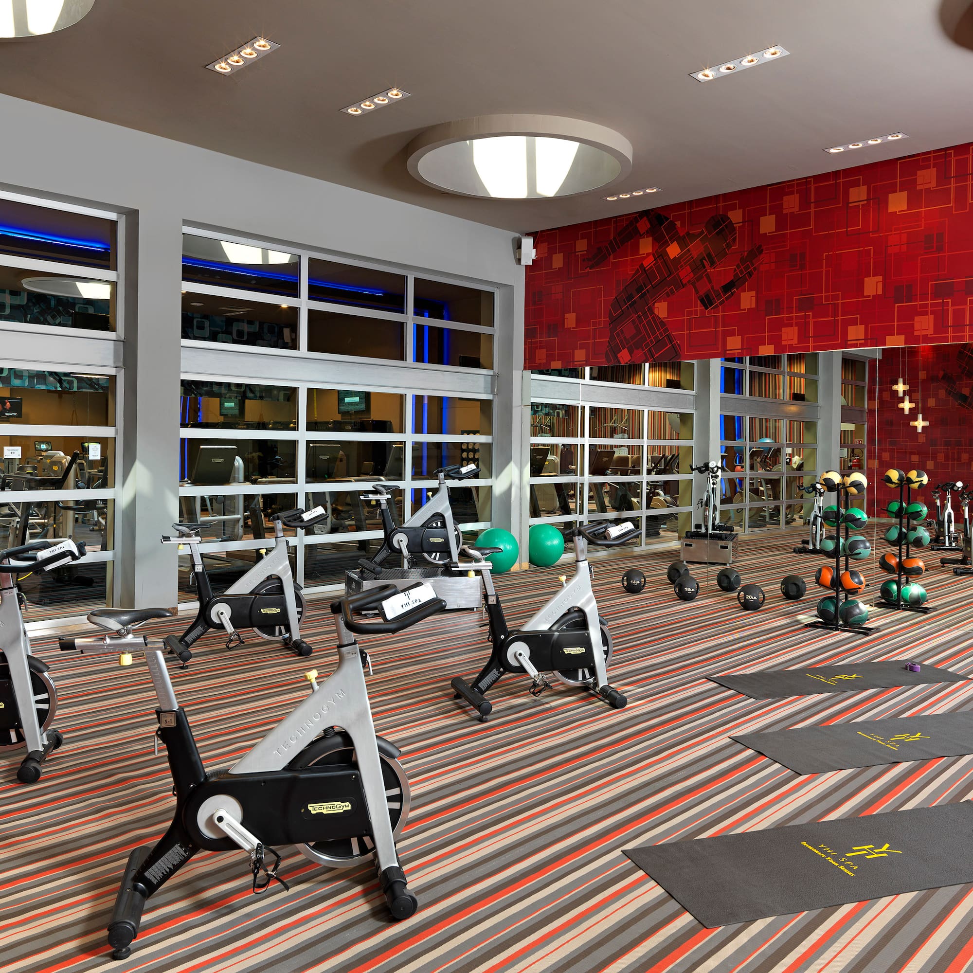 a room with exercise bikes and exercise equipment