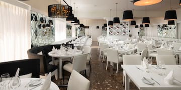 a room with tables and chairs