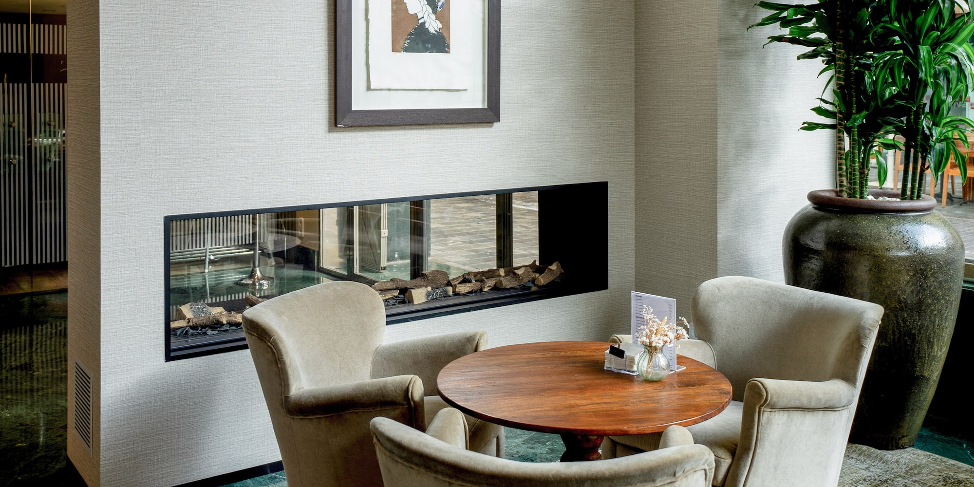 a room with a table and chairs