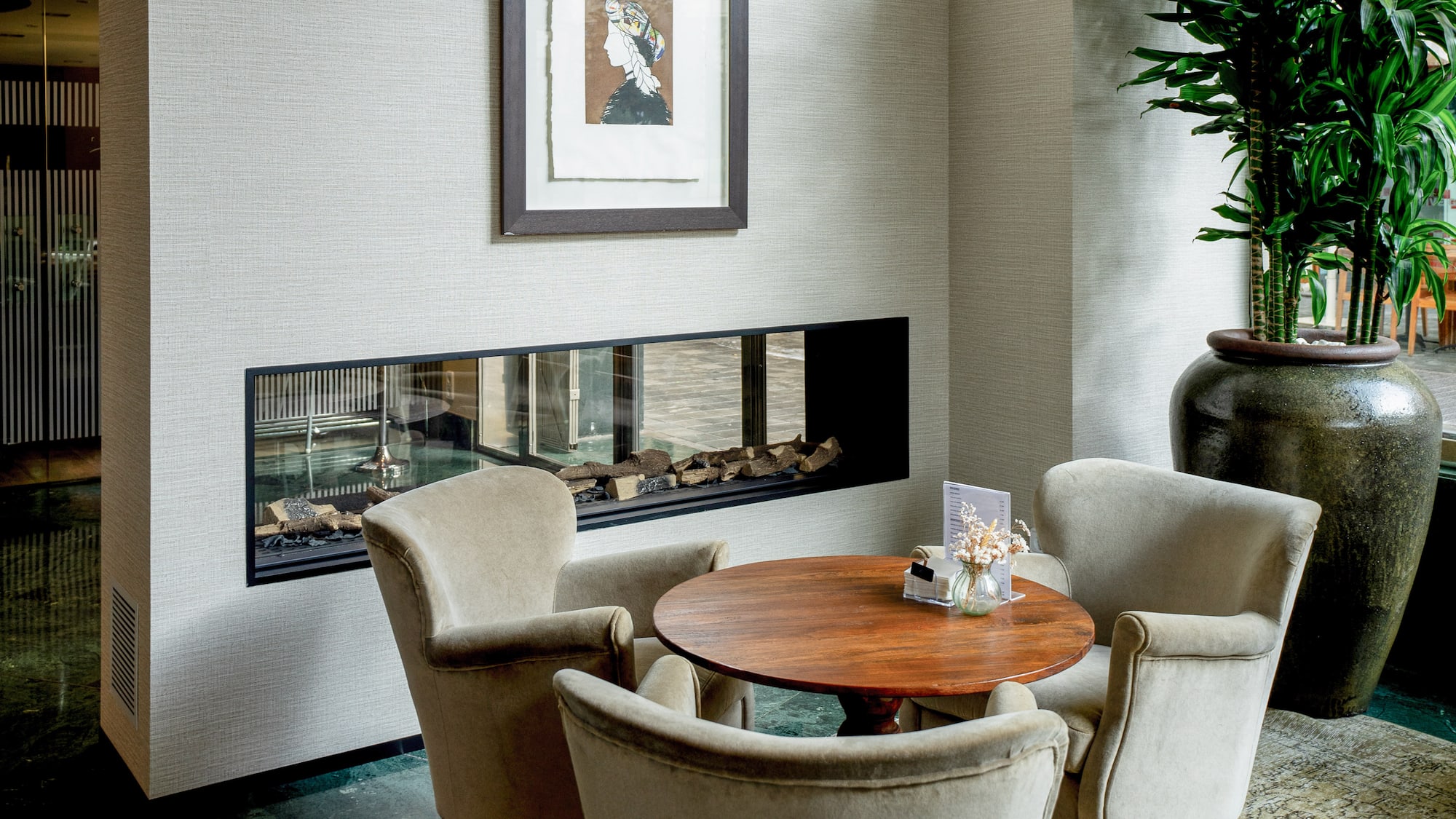 a room with a table and chairs