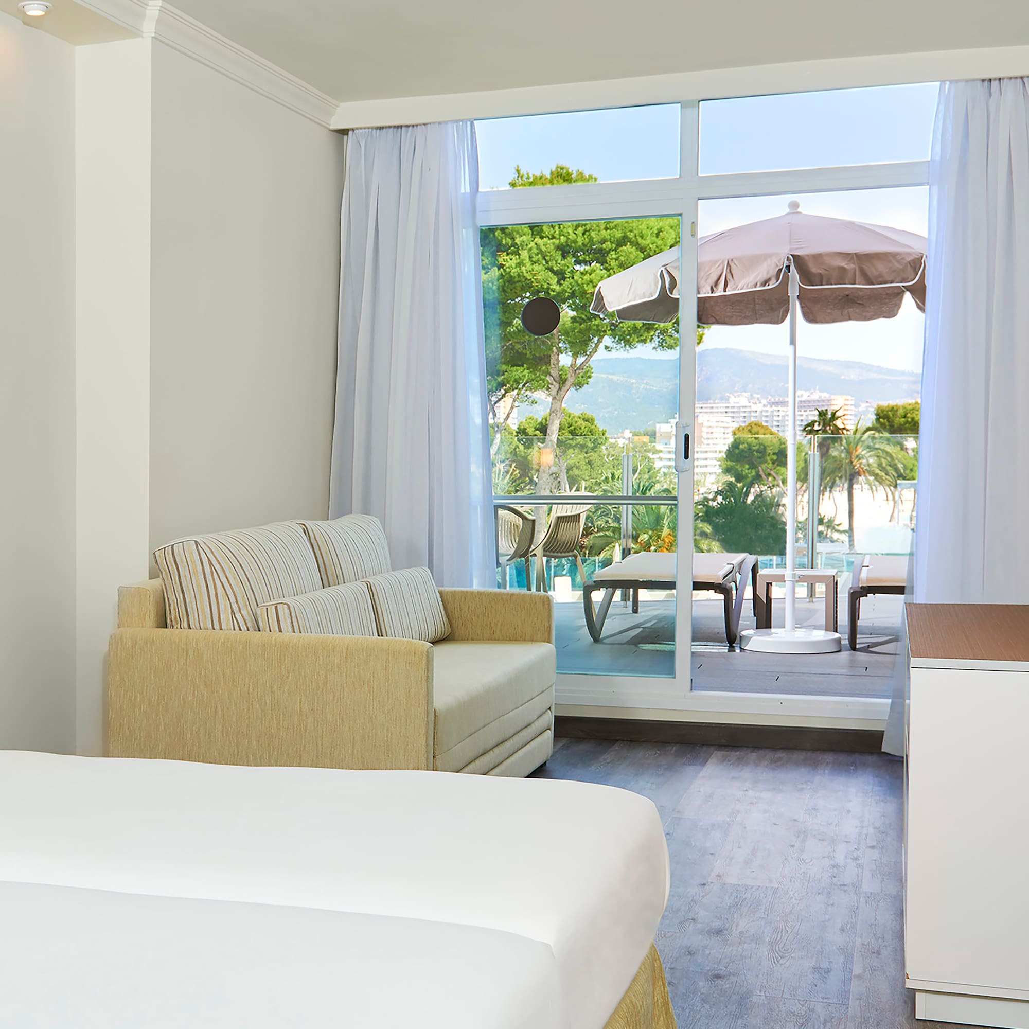 a room with a couch and a sofa