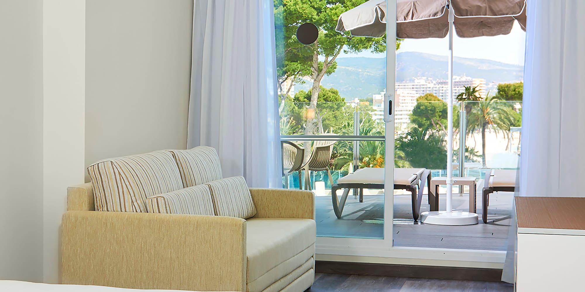 a room with a couch and a sofa