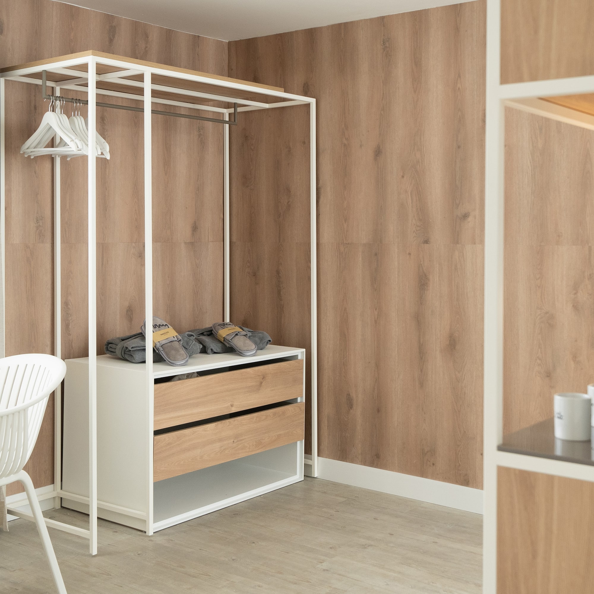 a room with a closet and a chair