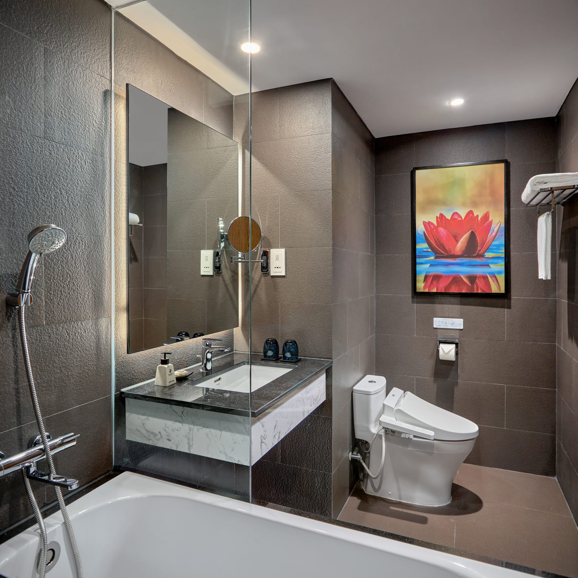 a bathroom with a bathtub and a toilet