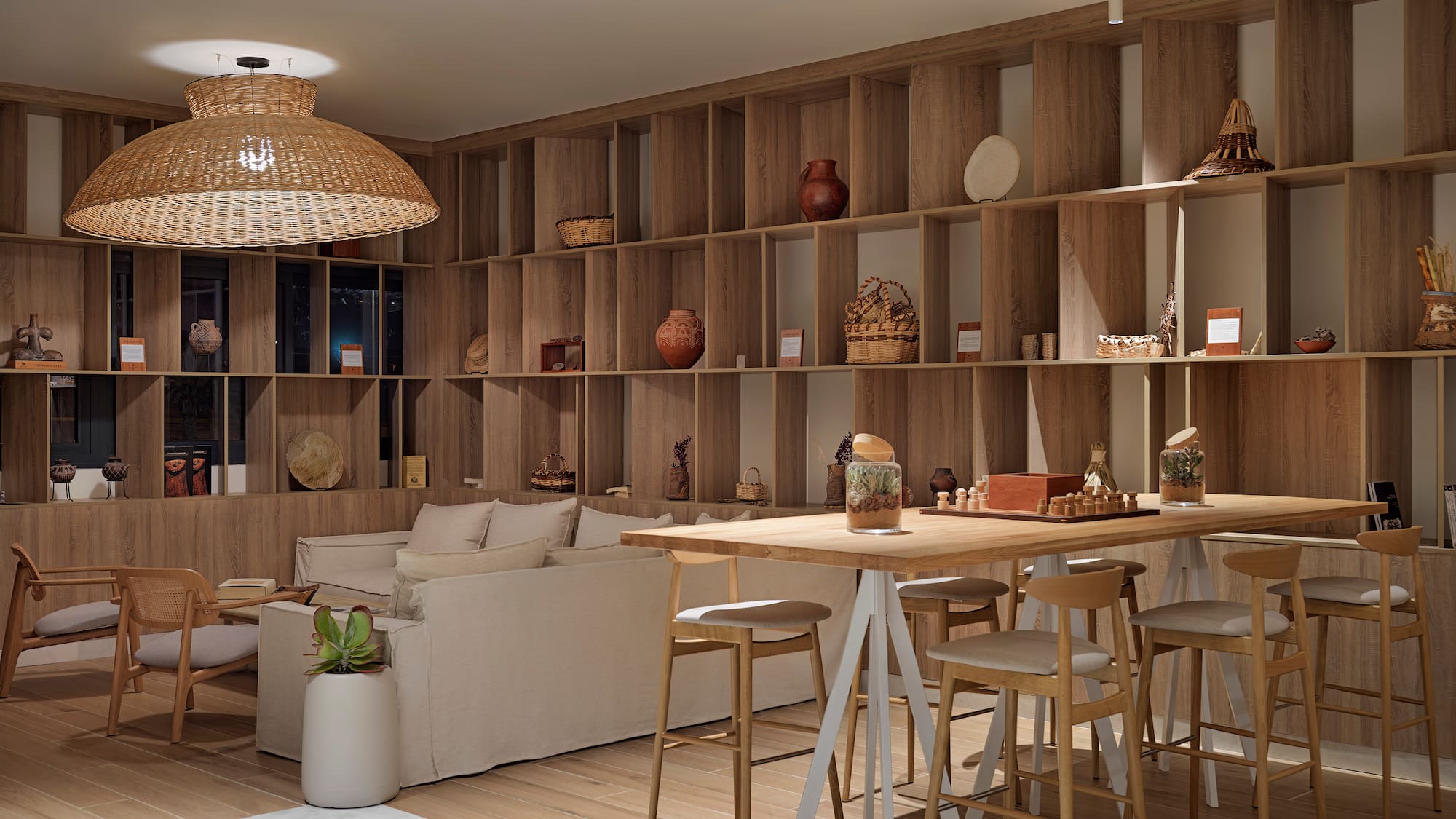 a room with a table and chairs and a couch