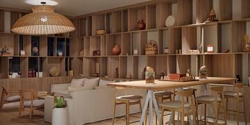 a room with a table and chairs and a couch