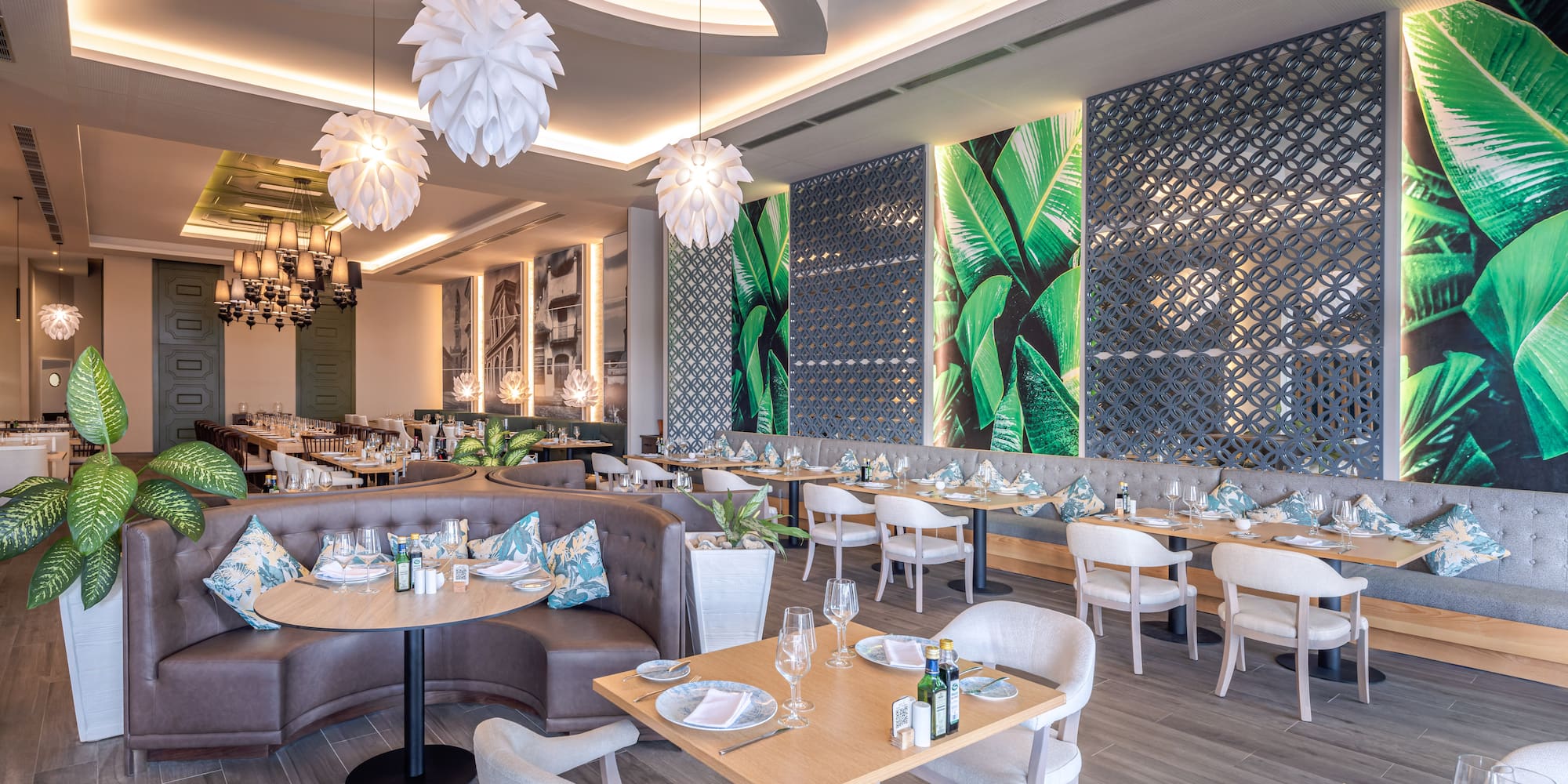 a restaurant with tables and chairs