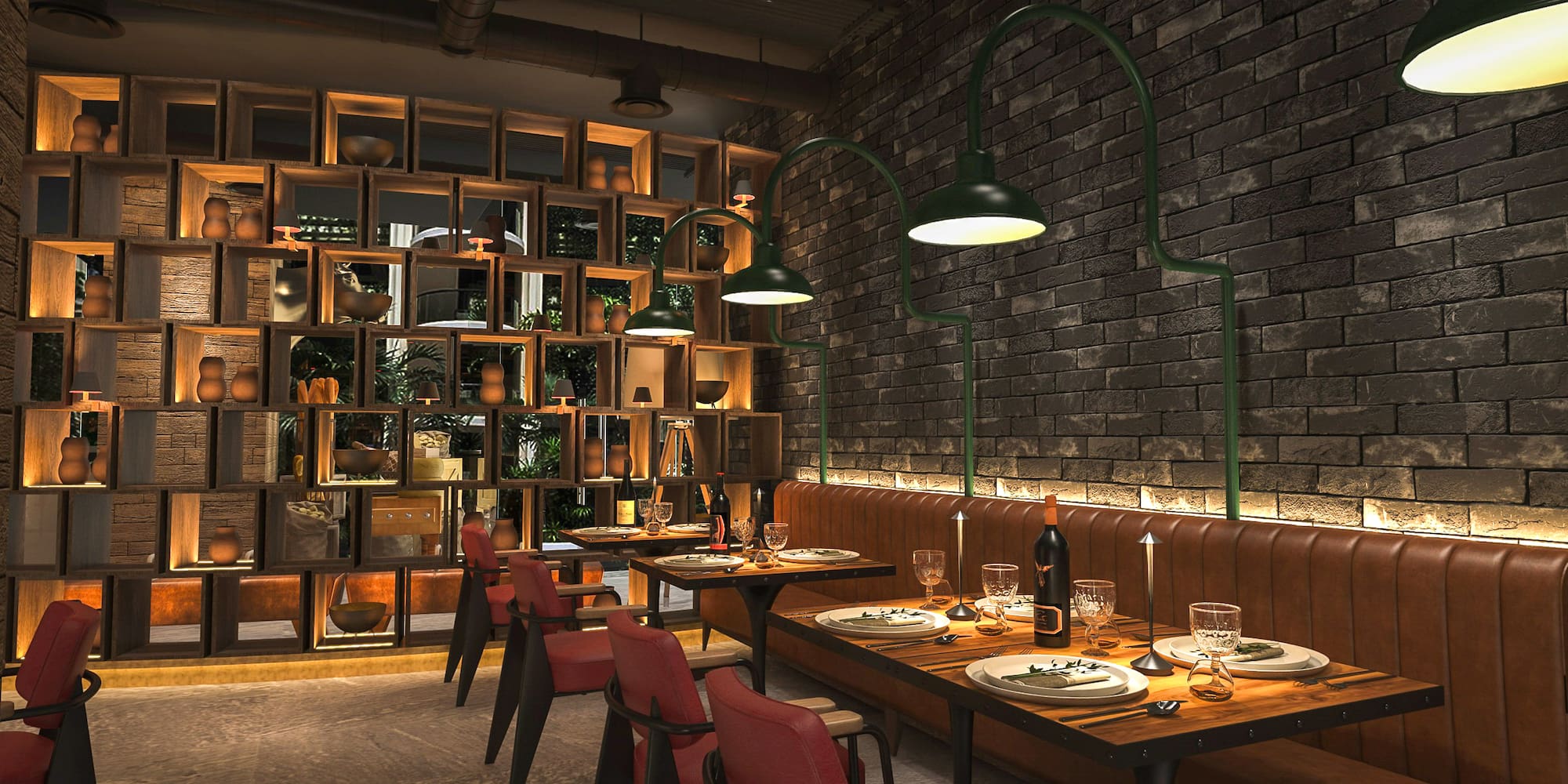 a restaurant with a brick wall and a table set with plates and wine glasses