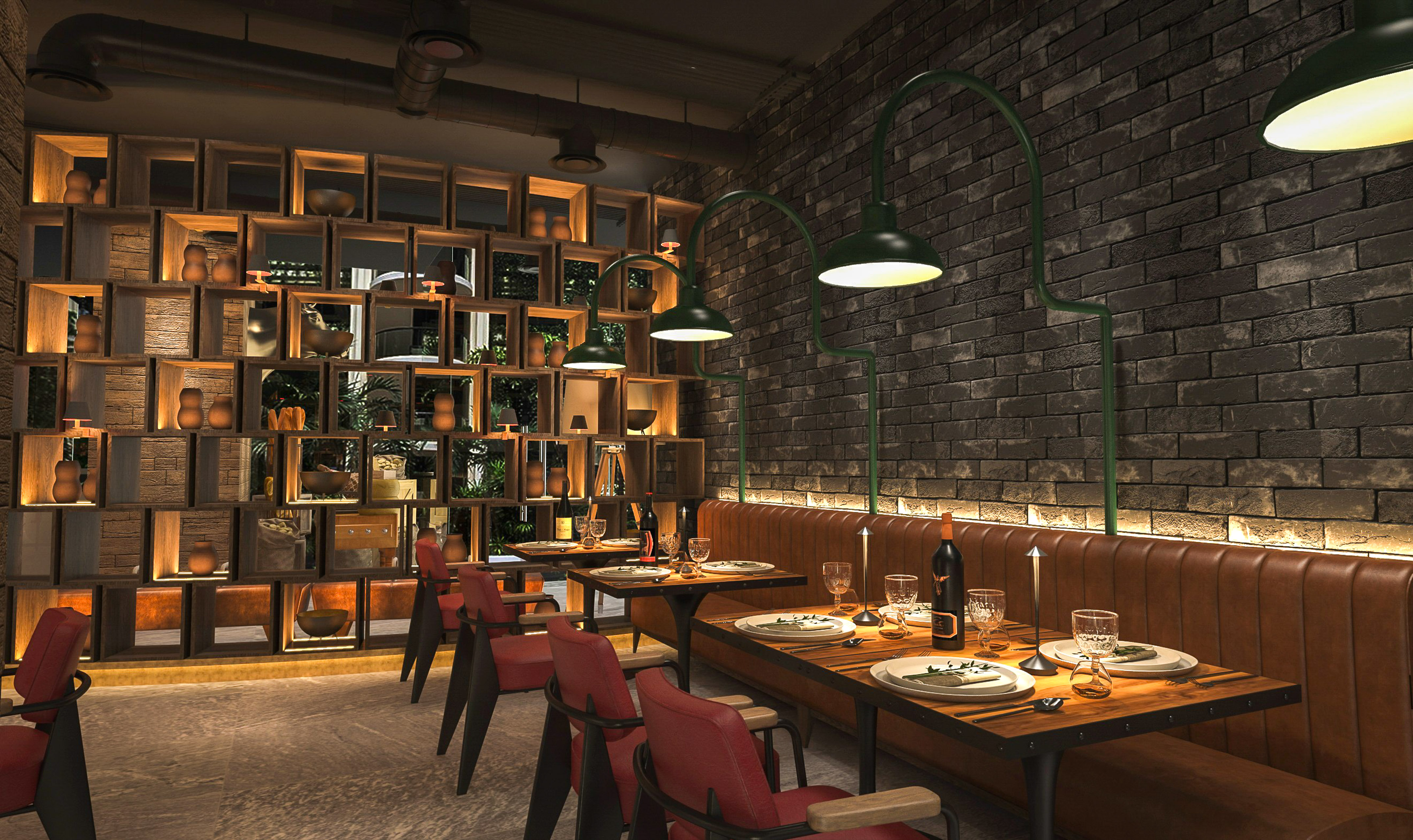 a restaurant with a brick wall and a table set with plates and wine glasses