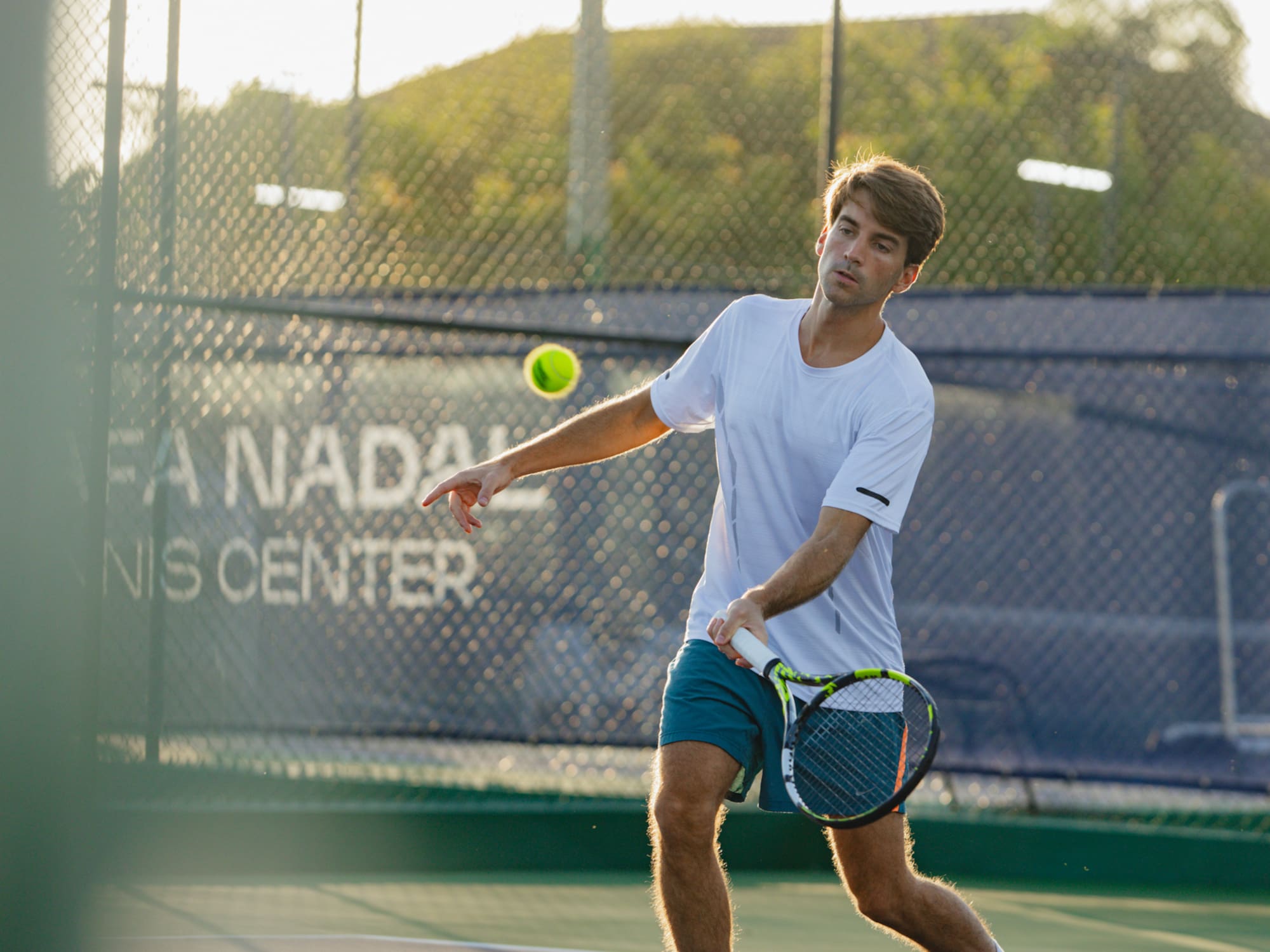 a man playing tennis