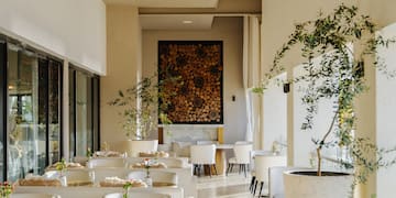 a room with tables and chairs