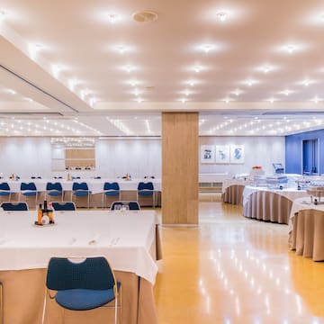 a room with tables and chairs