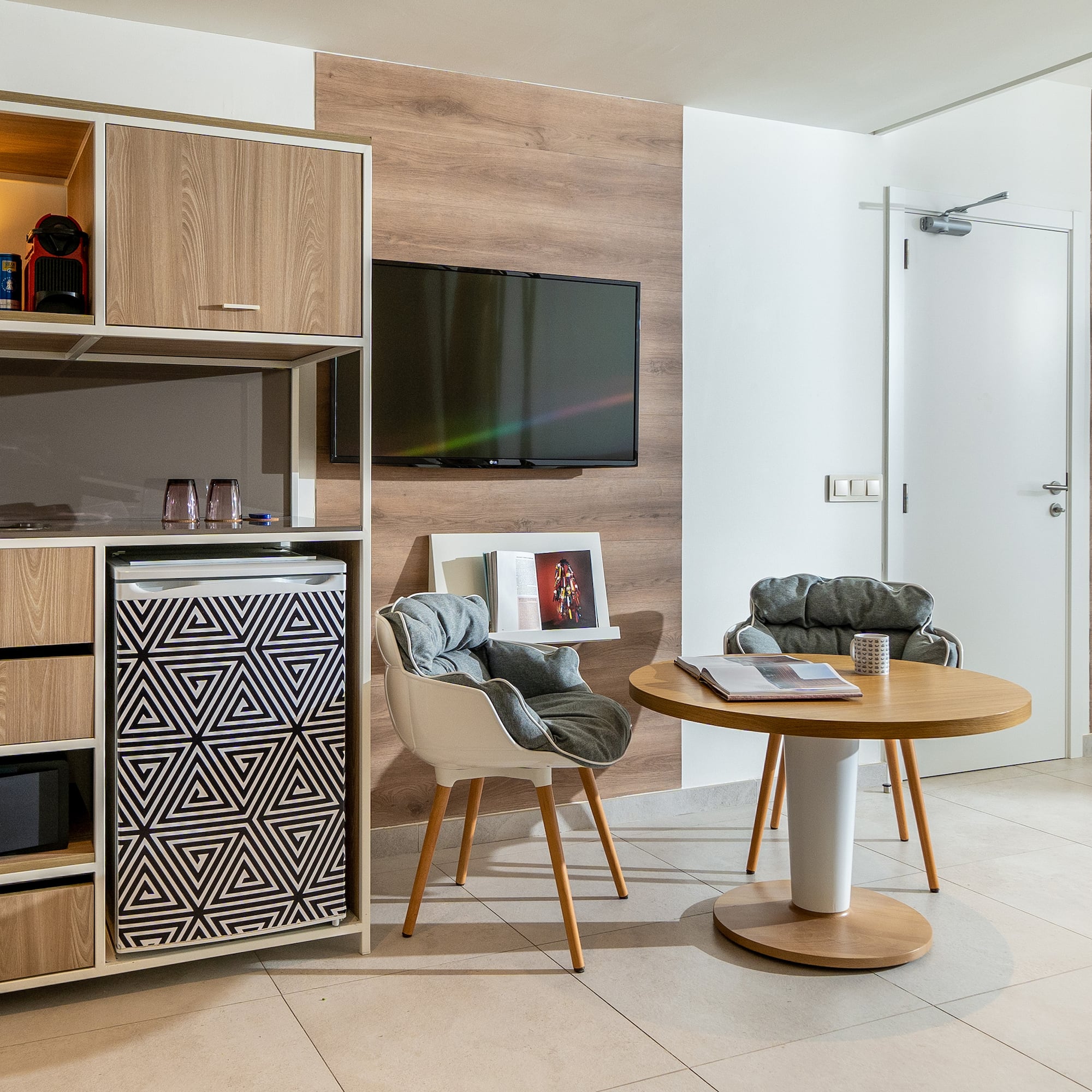 a room with a television and a table