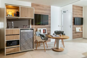a room with a television and a table