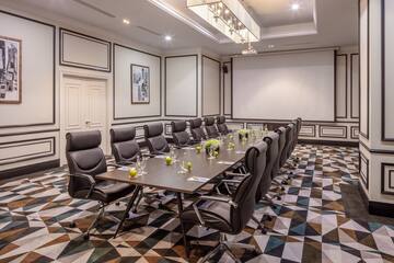 a conference room with chairs and tables