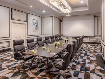 a conference room with chairs and tables