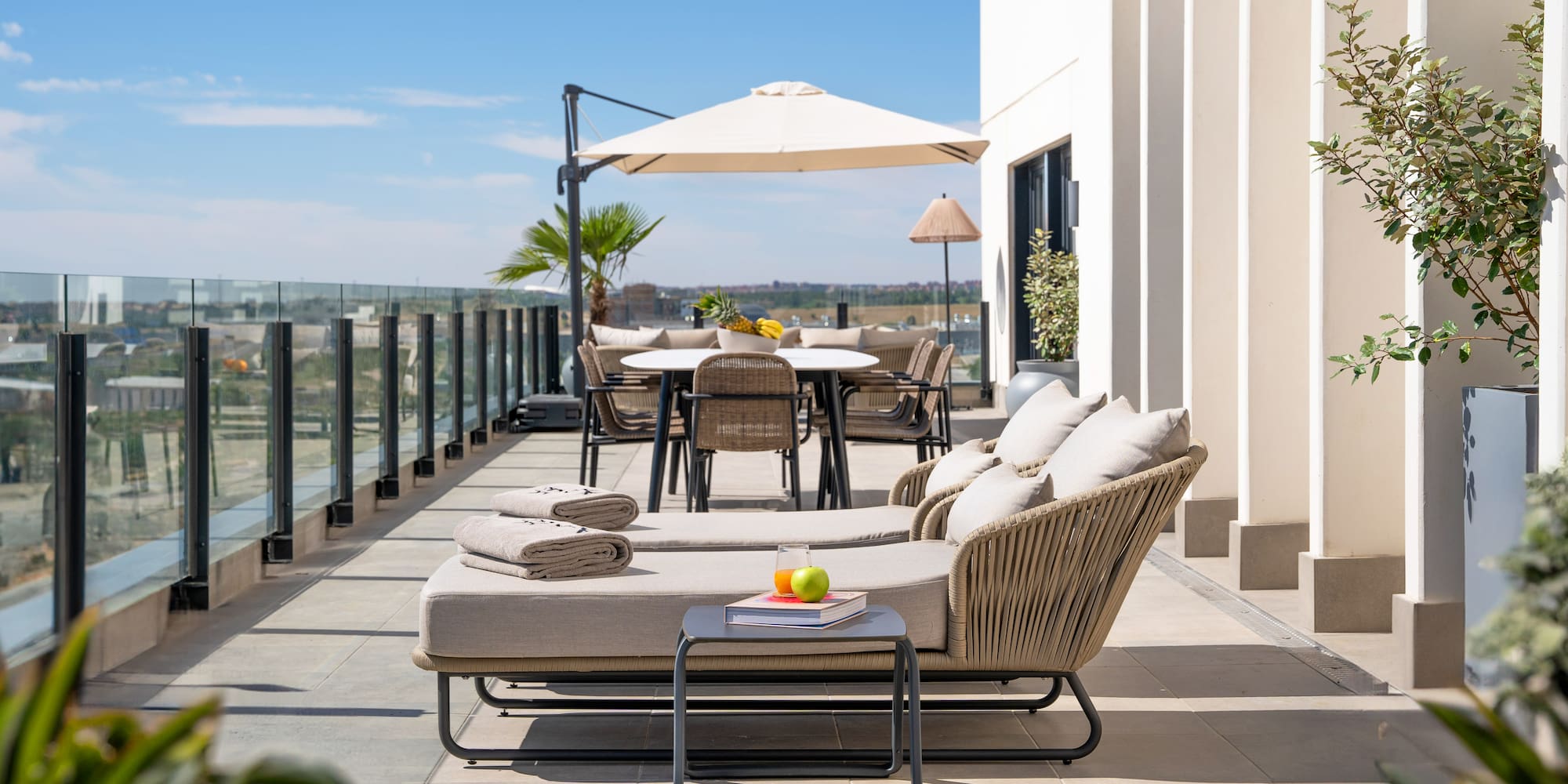 a patio with chairs and tables