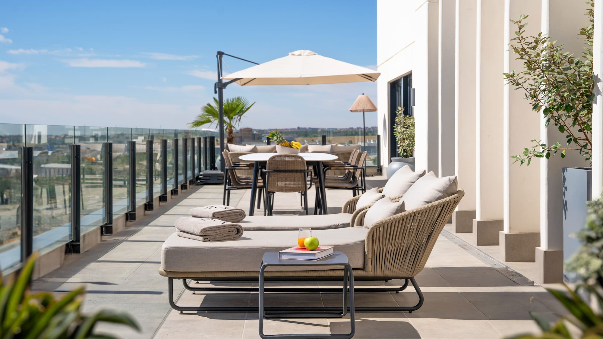 a patio with chairs and tables
