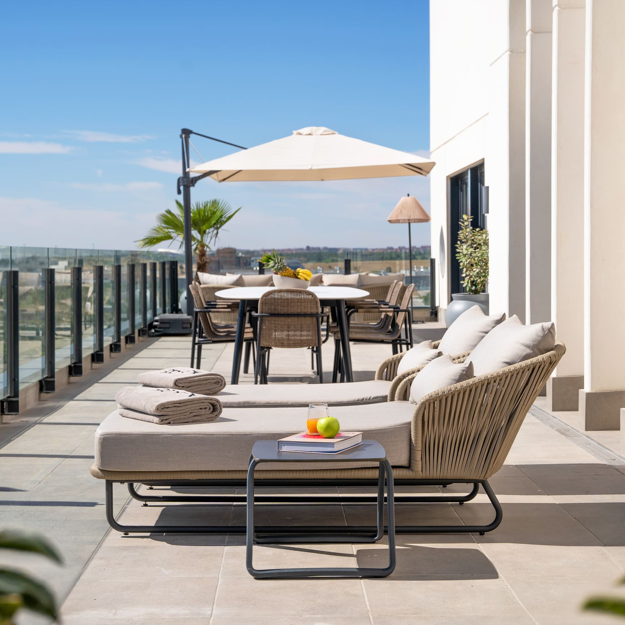 a patio with chairs and tables