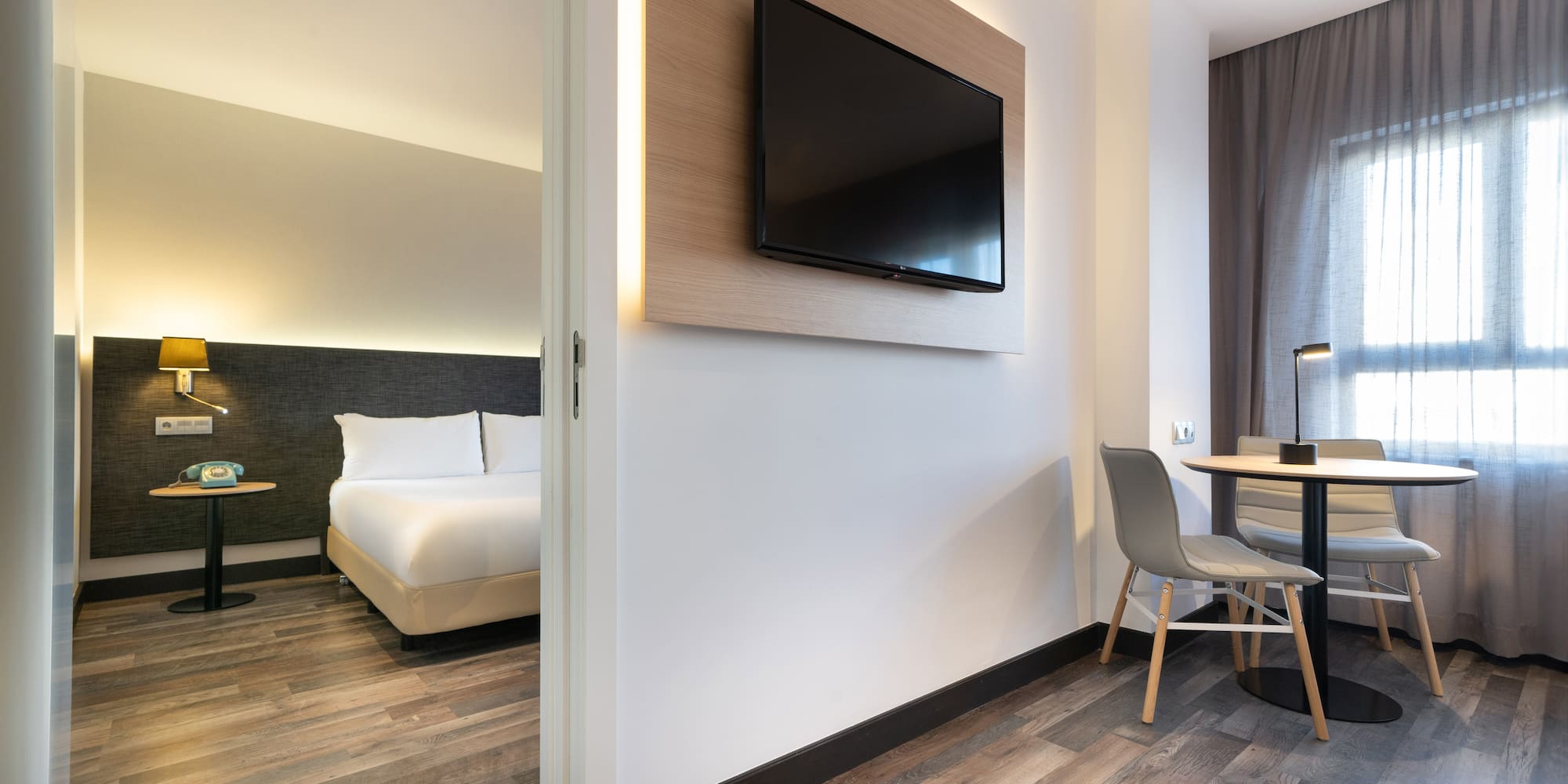 a room with a tv on the wall