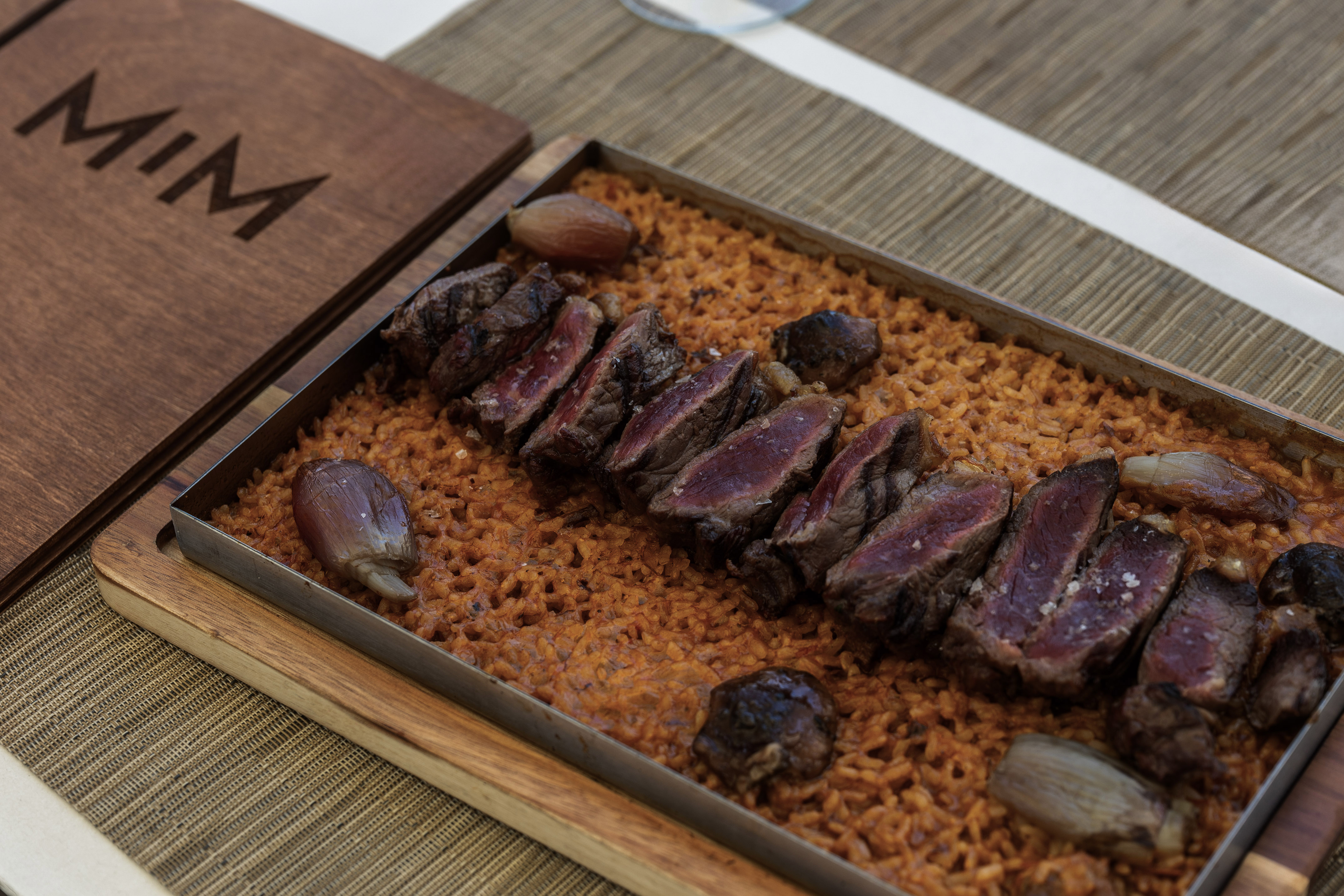 a plate of meat and rice