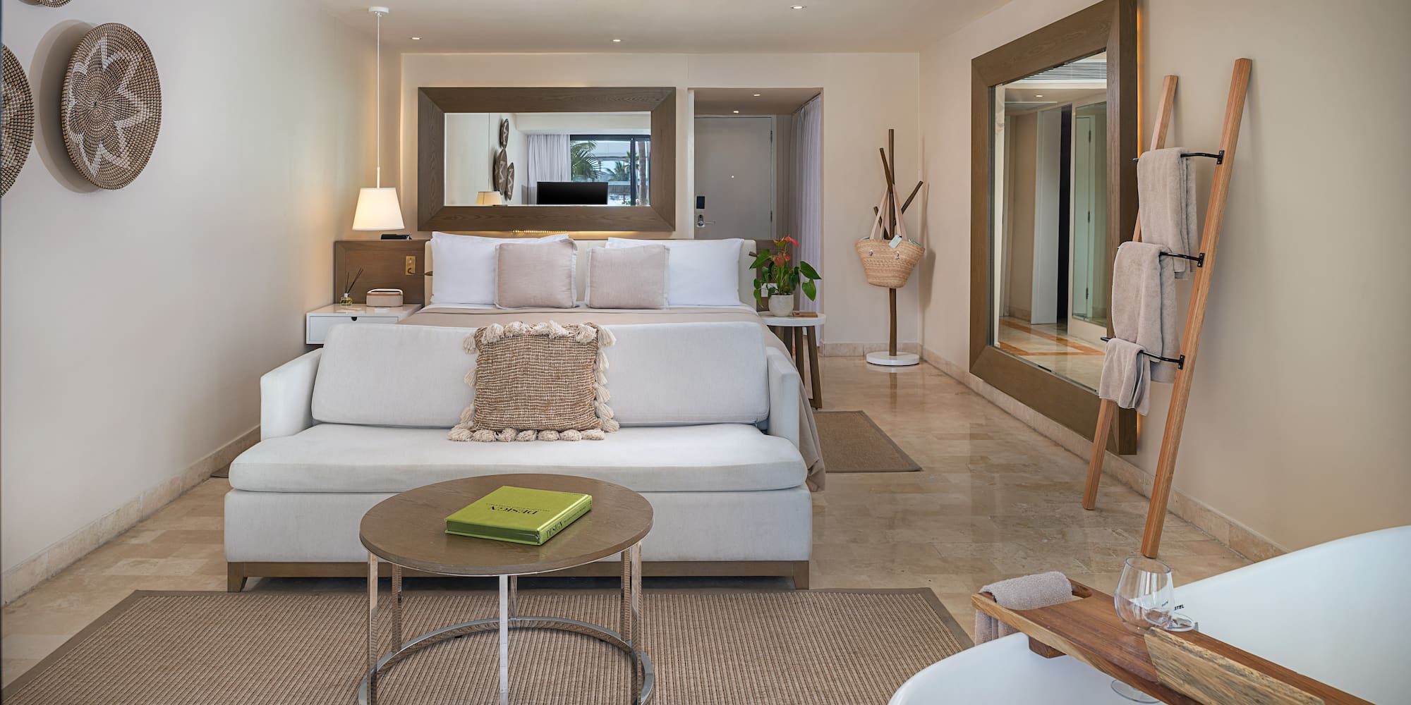 a room with a bed and a mirror