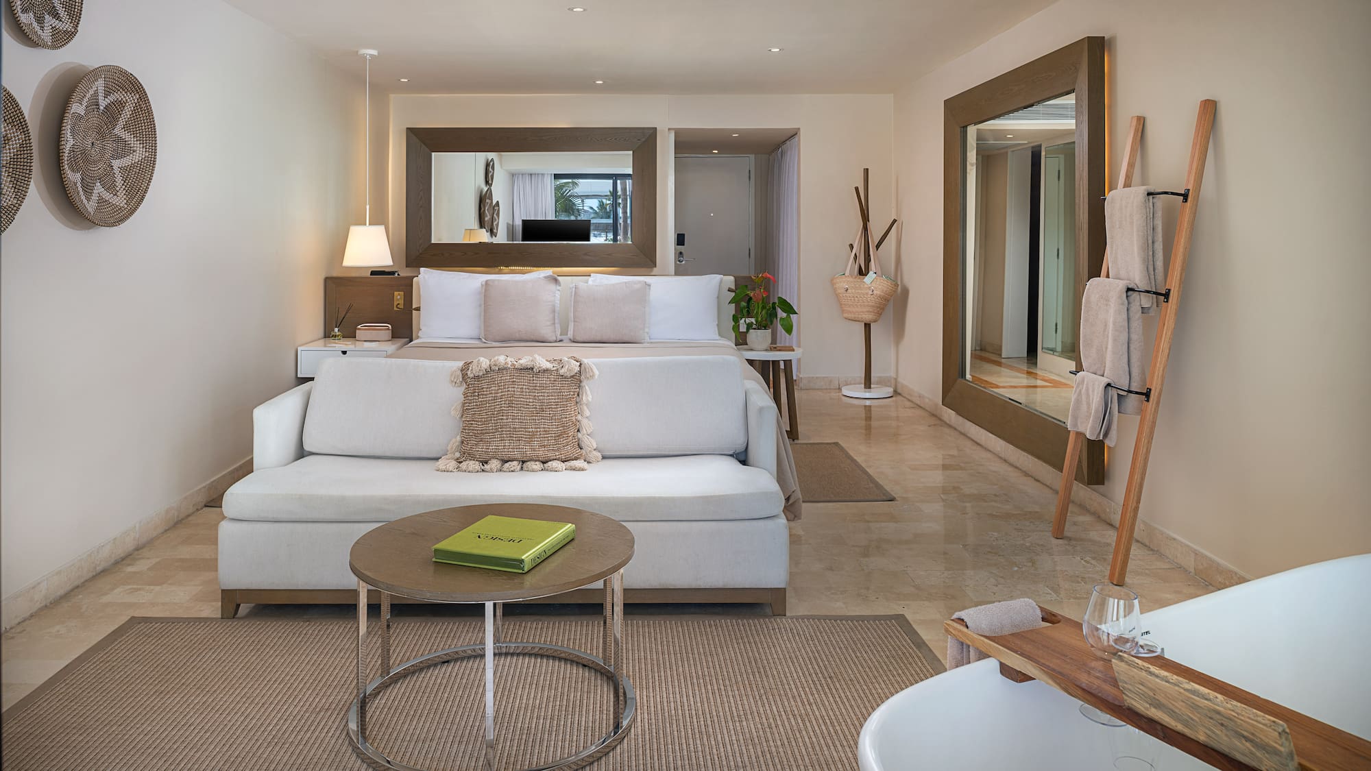 a room with a bed and a mirror