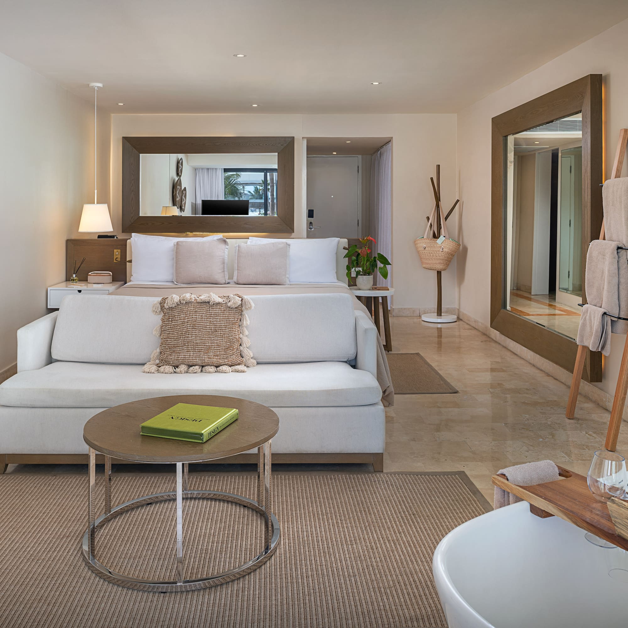 a room with a bed and a mirror