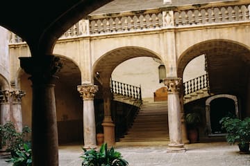 a stone building with a staircase