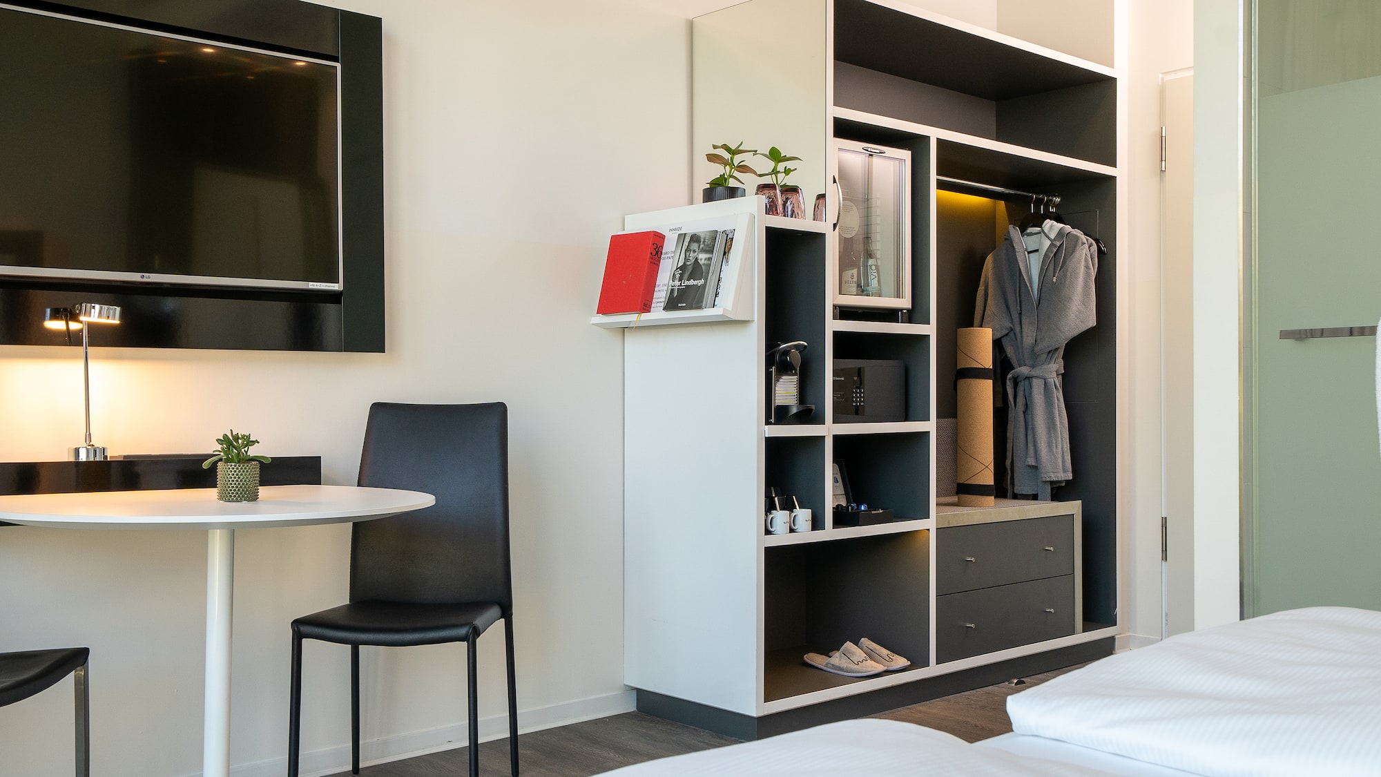 a room with a tv and a table