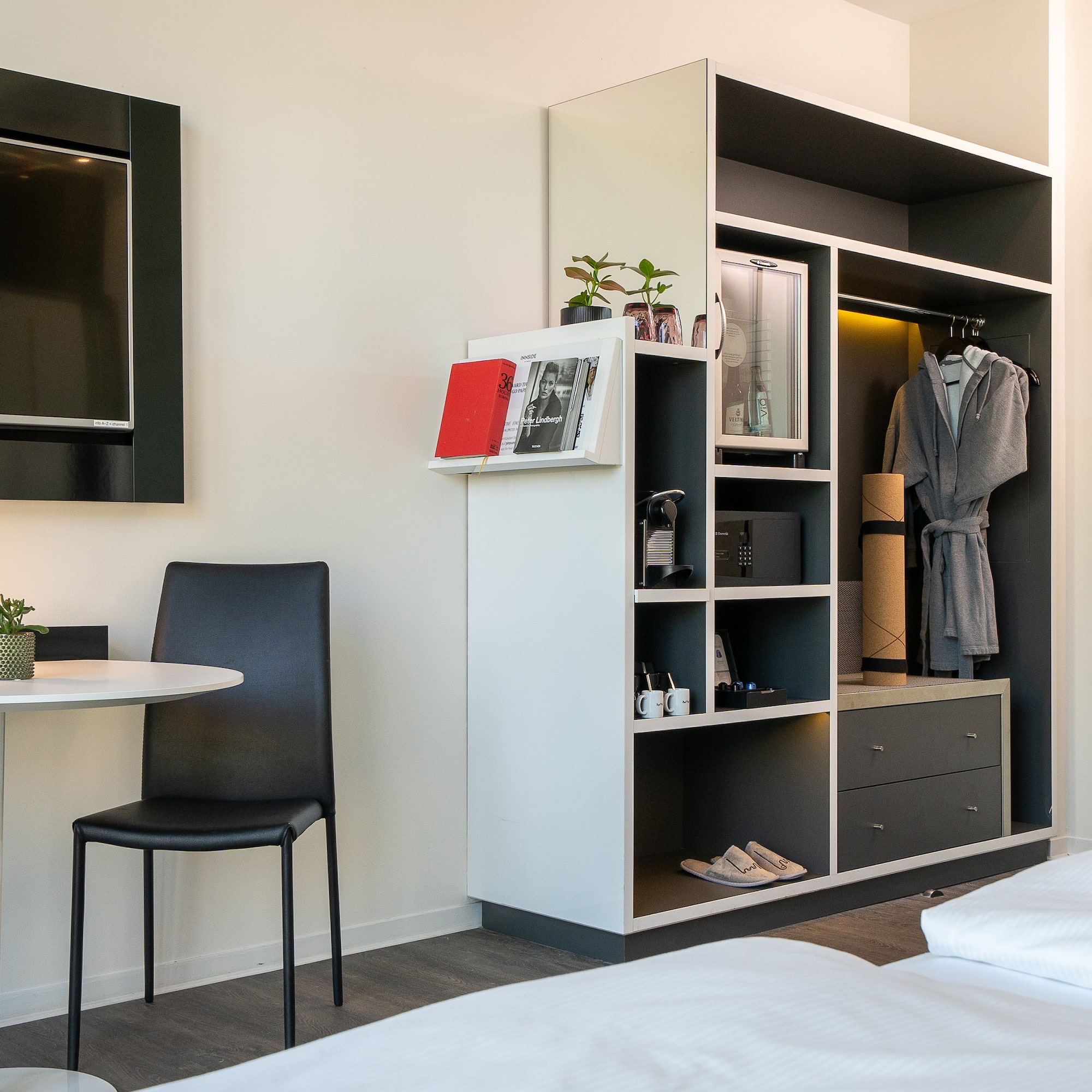 a room with a tv and a table