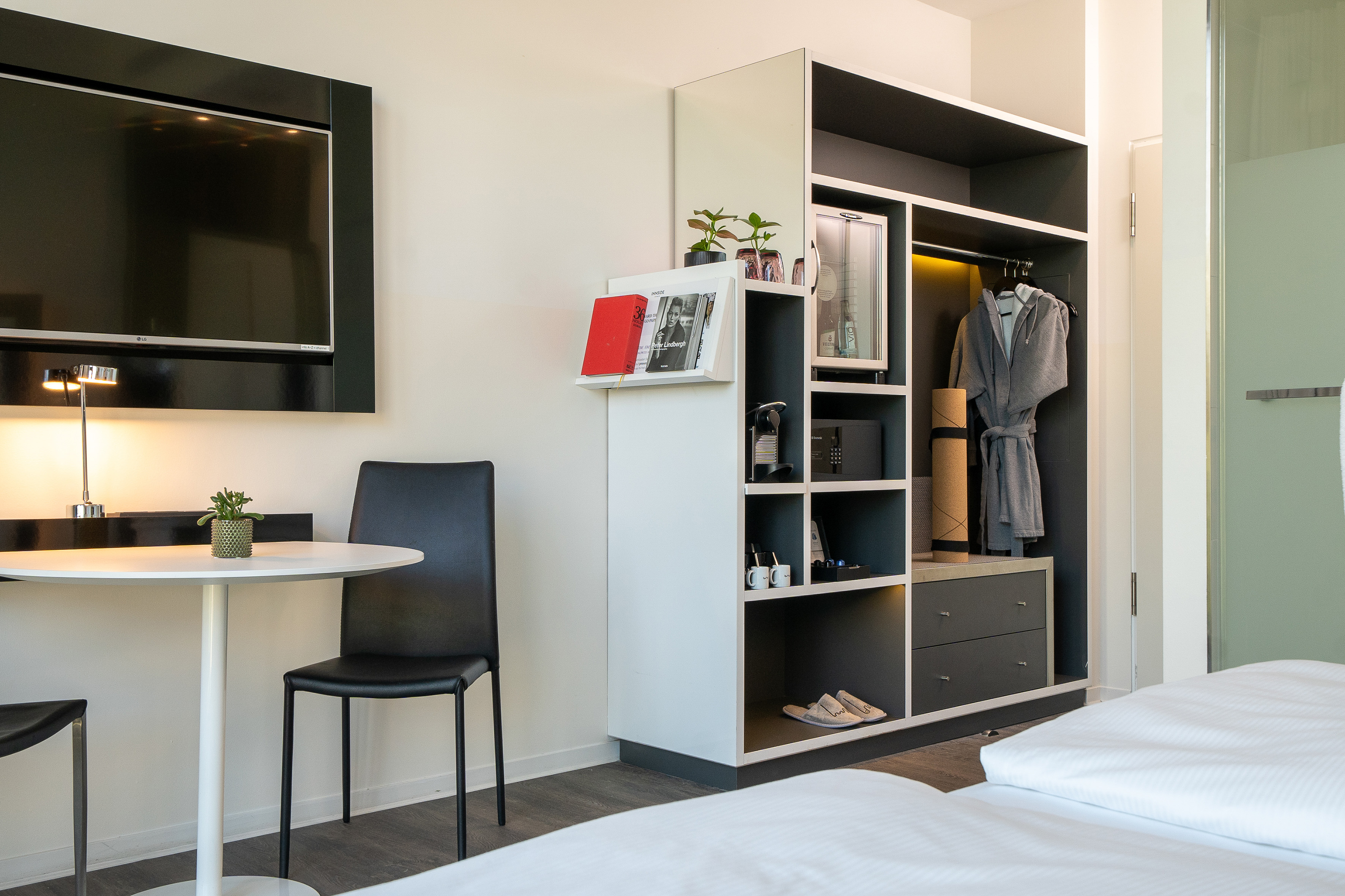 a room with a tv and a table