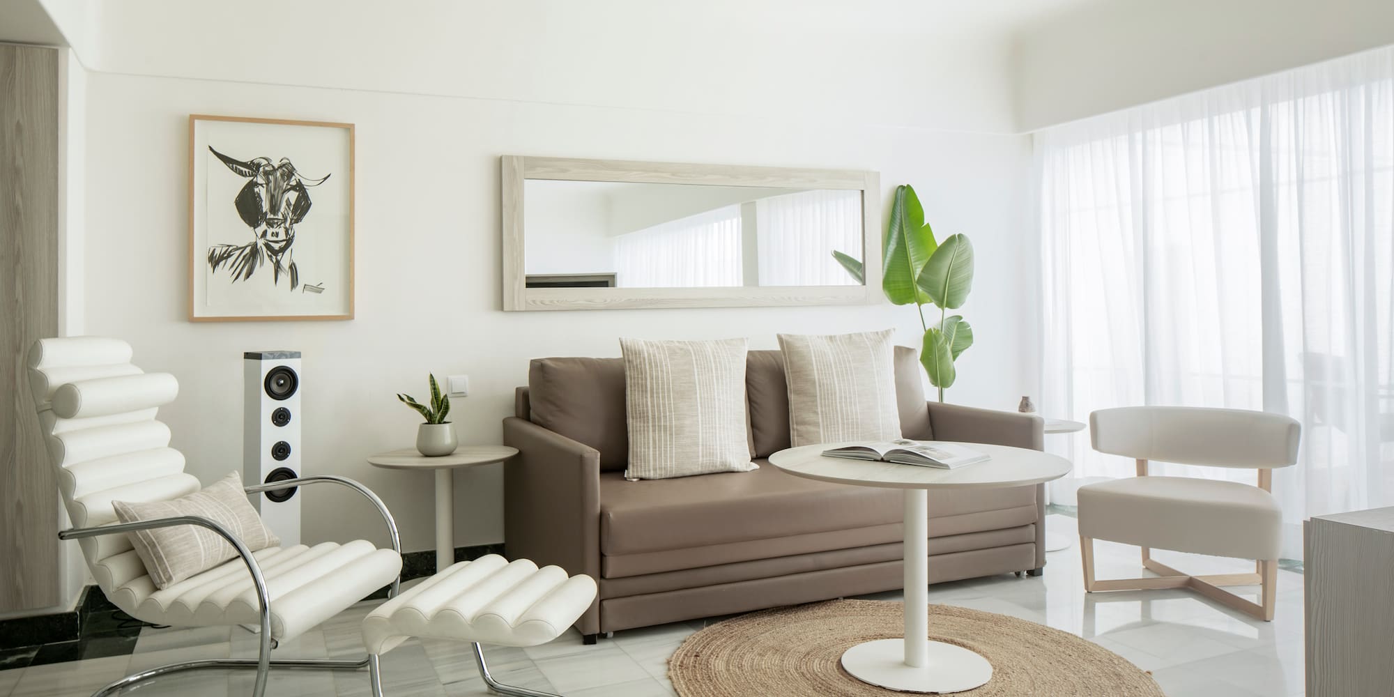a living room with a couch and a table
