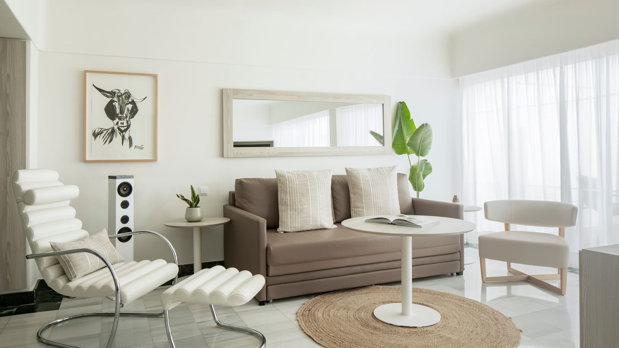 a living room with a couch and a table