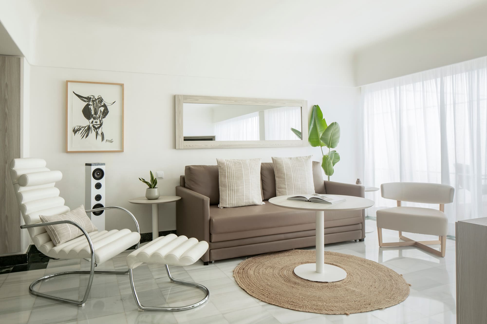 a living room with a couch and a table