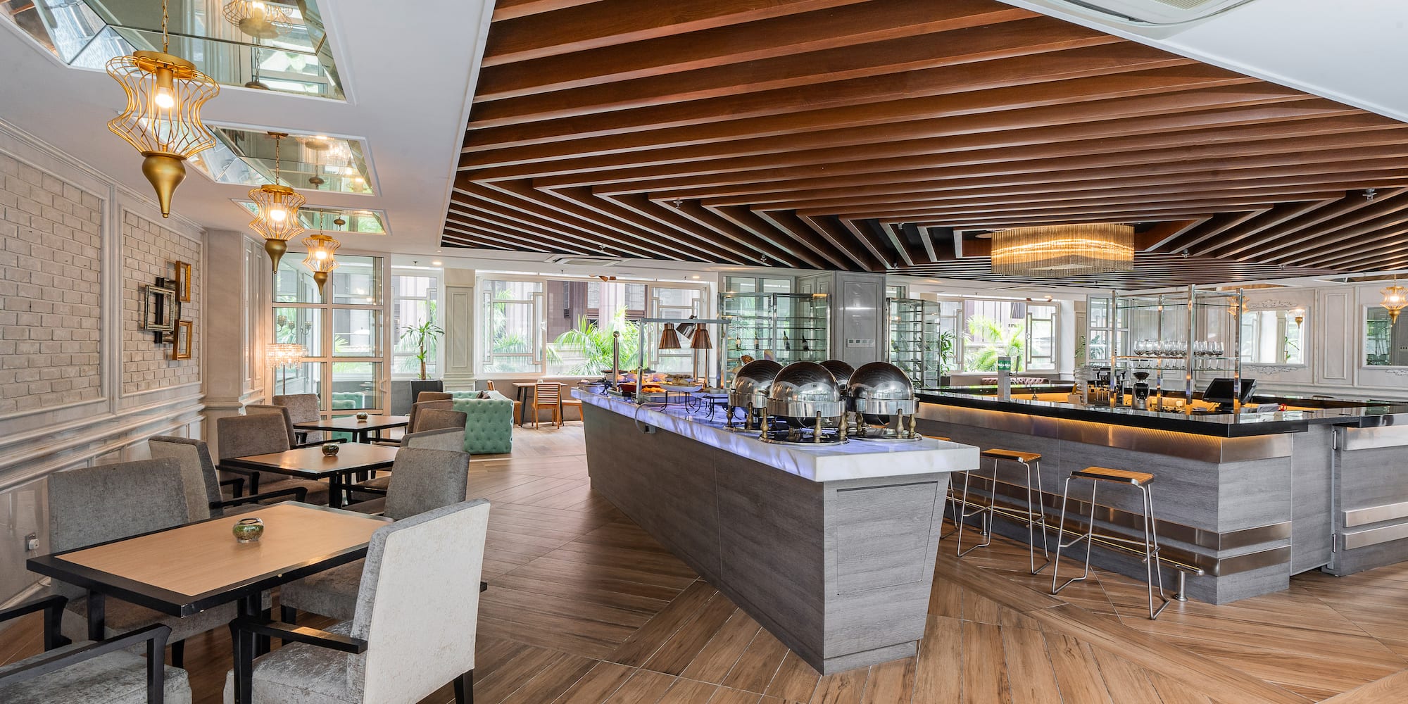 a restaurant with a bar and chairs