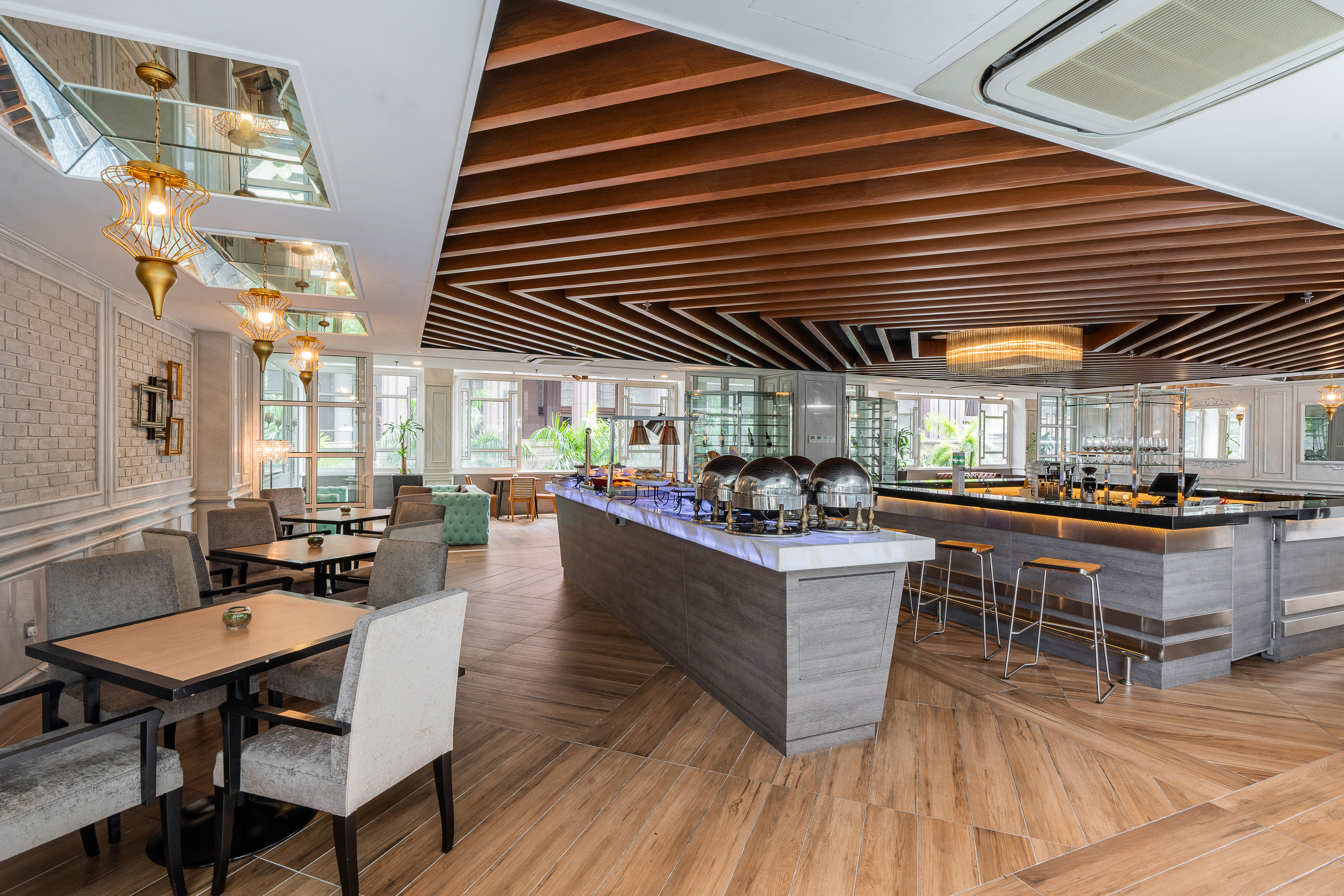 a restaurant with a bar and chairs