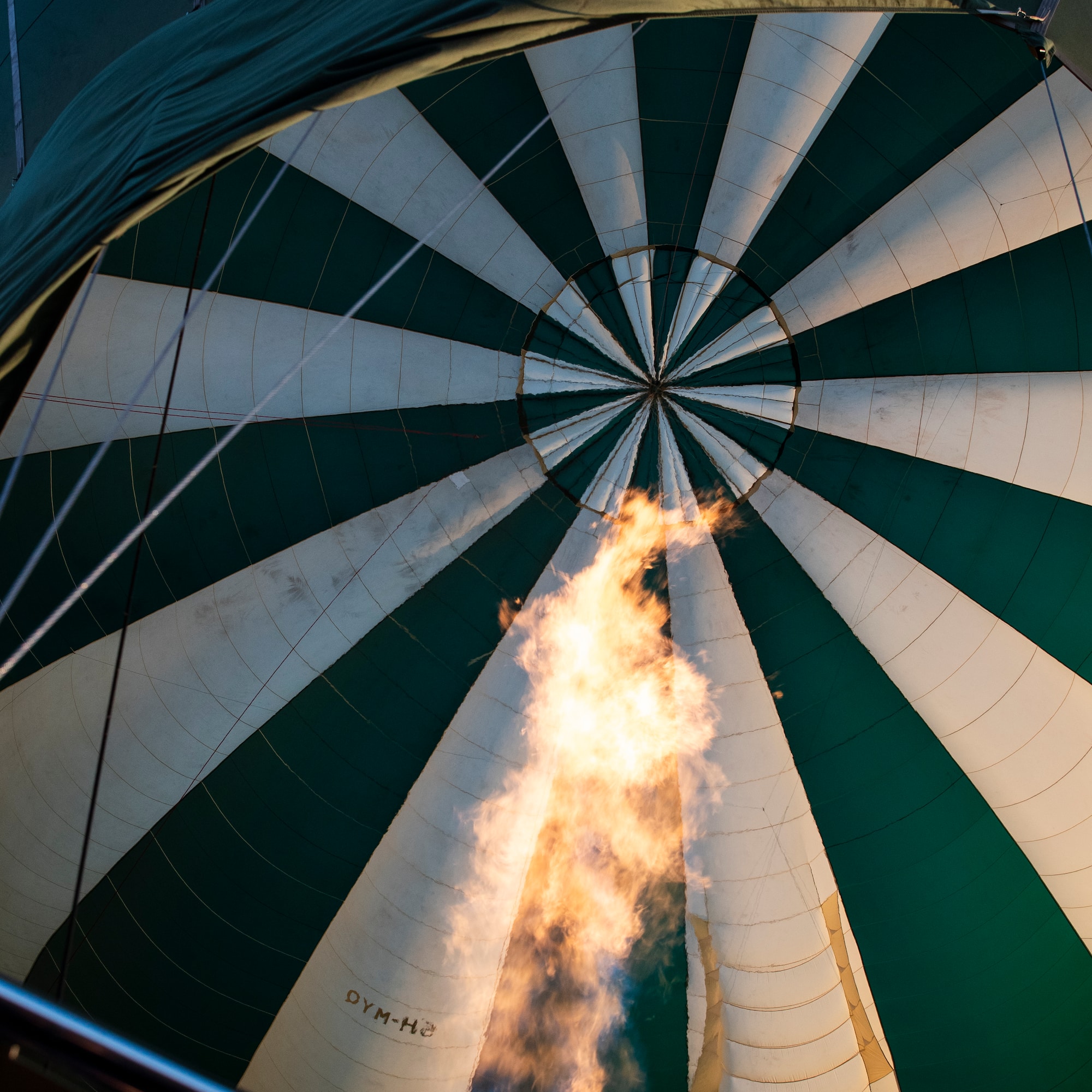a hot air balloon with a flame